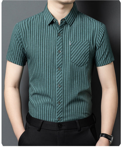 Close-up of deep teal men's pinstripe shirt fabric collar and chest pocket