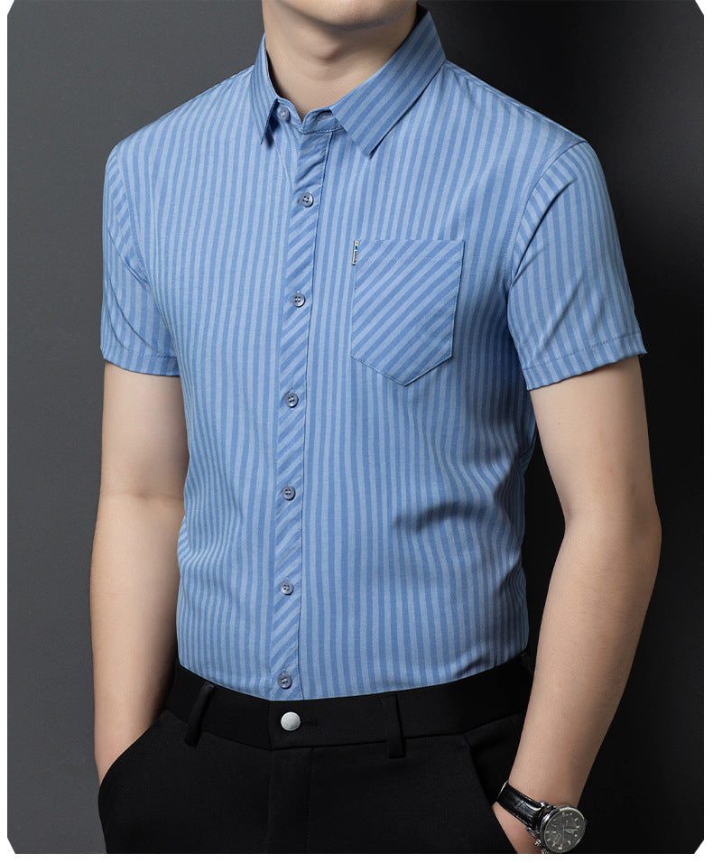 Jiskavi men's sky blue pinstripe shirt worn with black trousers at an angle