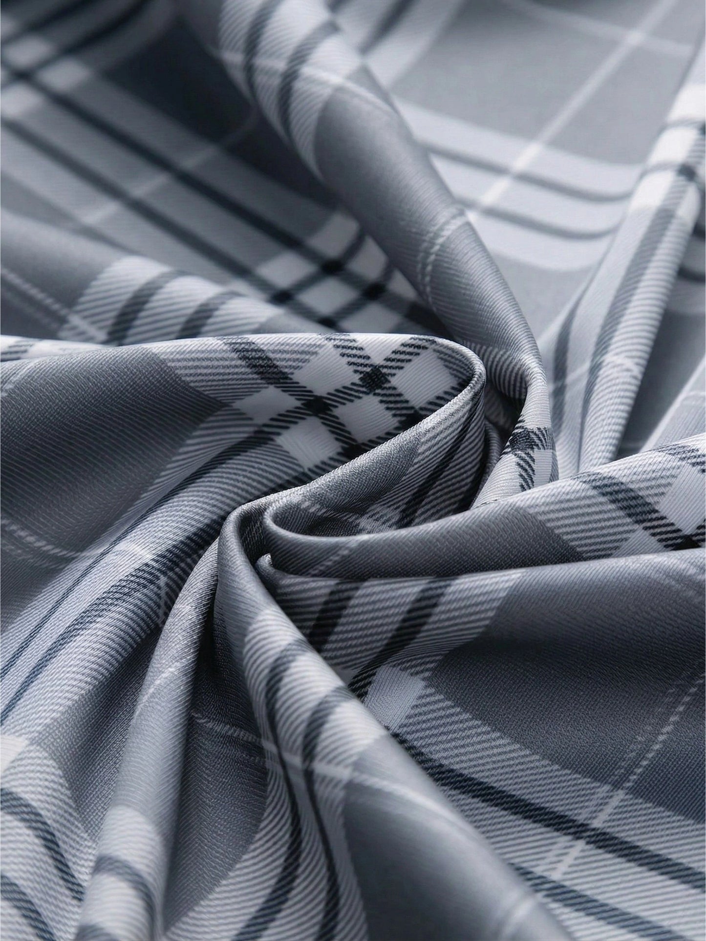 Jiskavi slate grey heritage plaid premium stretch cotton fabric — silky drape and sheen detail closeup