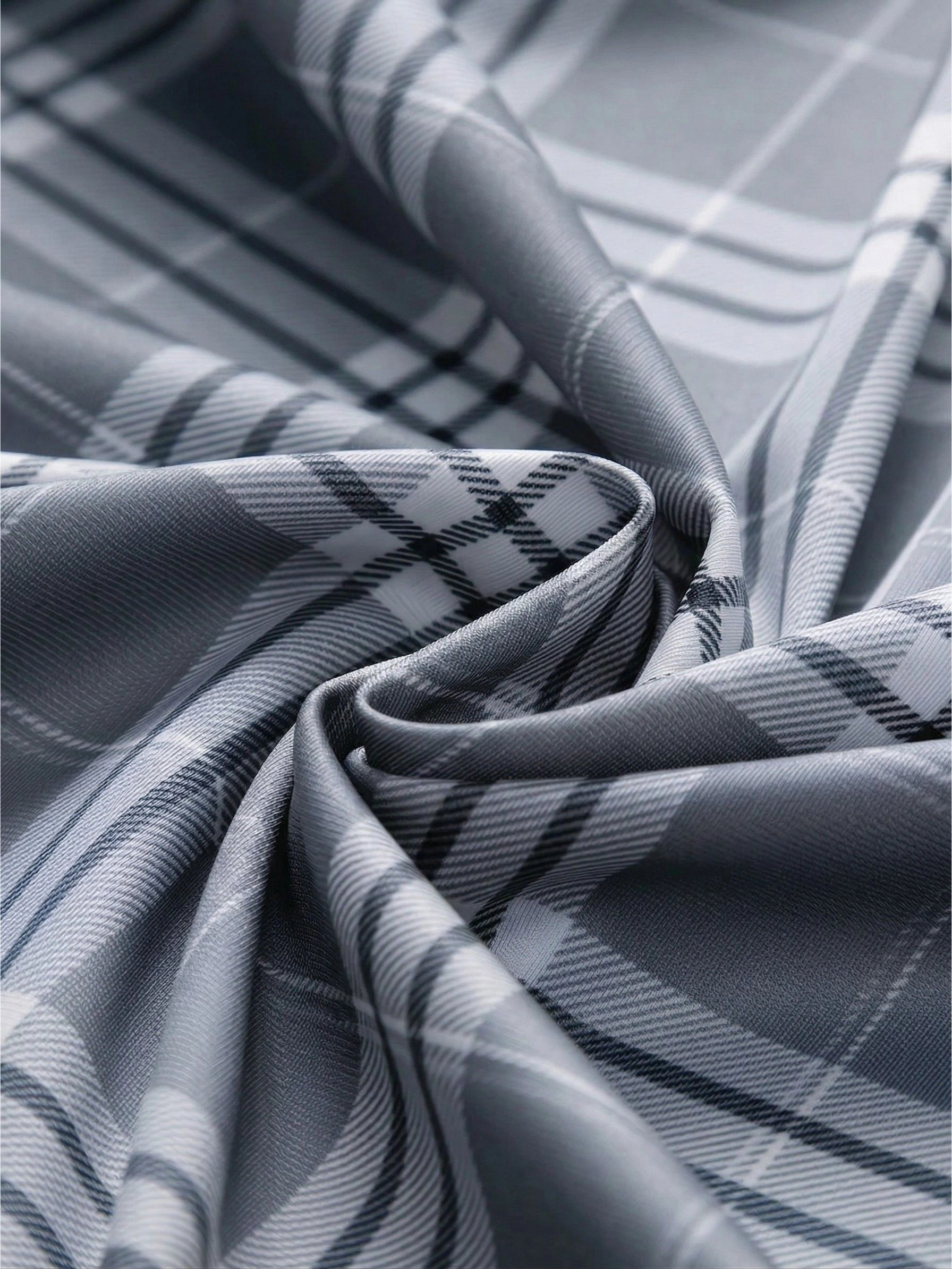Jiskavi slate grey heritage plaid premium stretch cotton fabric — silky drape and sheen detail closeup