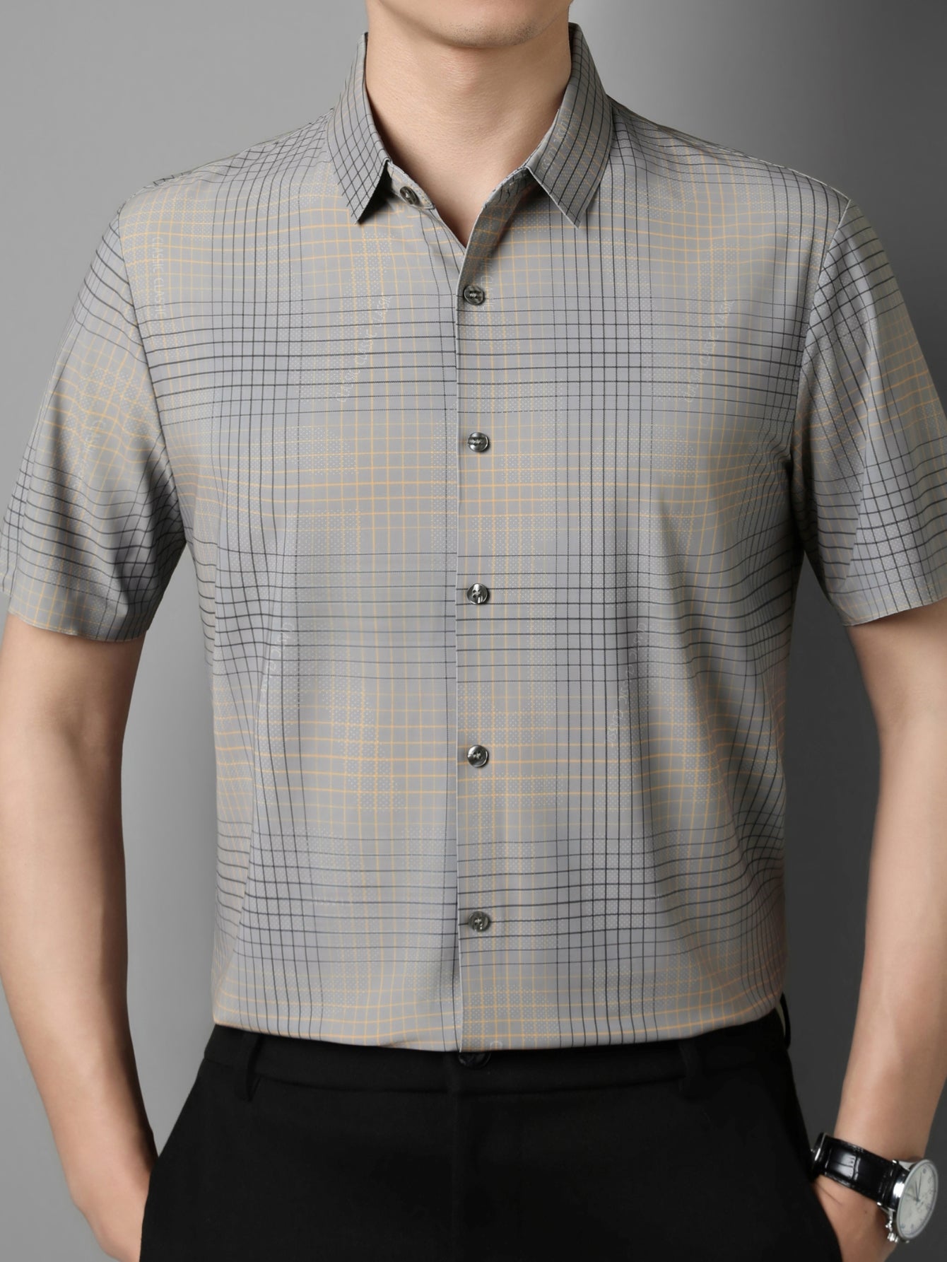 Jiskavi stone grey windowpane plaid slim fit half sleeve men's shirt — front view on model with black trousers