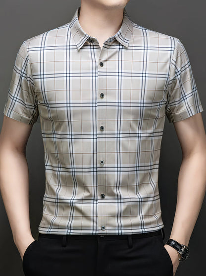 Jiskavi warm beige large plaid check slim fit half sleeve men's shirt — front view on model with black trousers