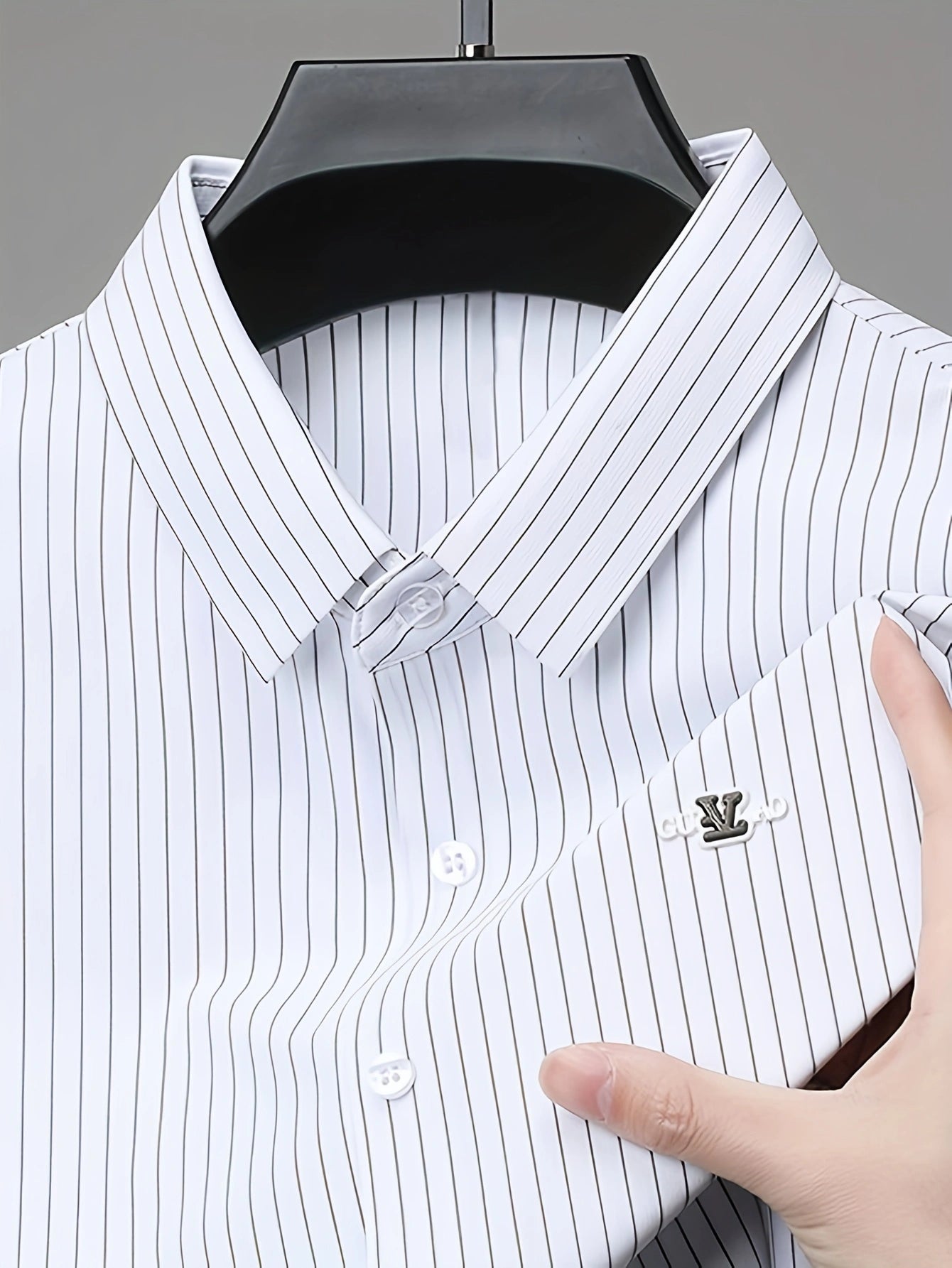 Jiskavi white pinstripe shirt — point collar with collar stays, metal chest badge and white pearl buttons